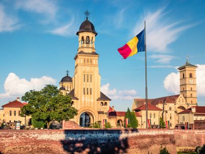 mazing morning view of bell tower of Reunification Cathedral, Fortified churches inside Alba Carolina Fortress. Splendid summer scene of Transylvania, Alba Iulia city, Romania, Europe.